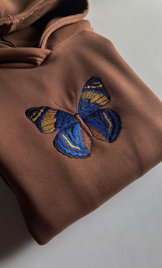 Vibrant Blue Butterfly Embroidered Brown Unisex Hoodie | Oversized Naturecore Jumper