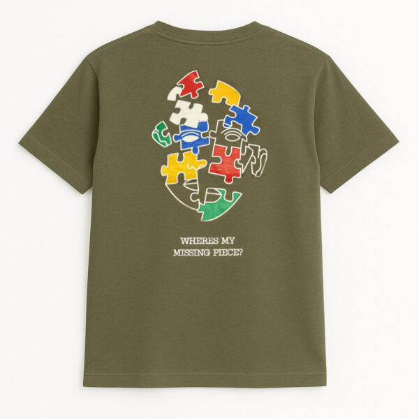 "Where’s My Missing Piece?" – Olive Green Puzzle Face Graphic Tee for Men | KRRITRA